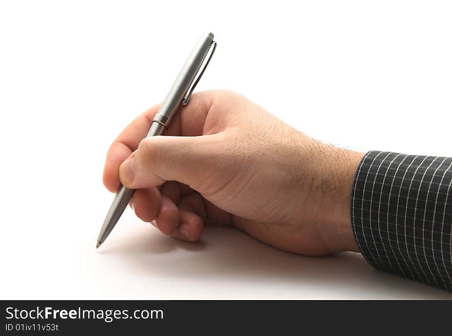 Hand with black shirt holding silver metal pen on white background, writing