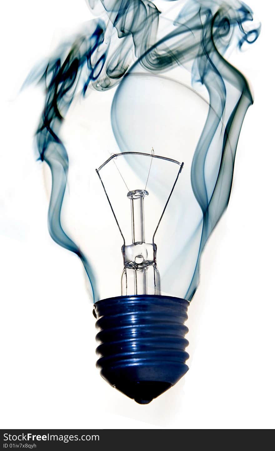 Burning light bulb with blue smoke