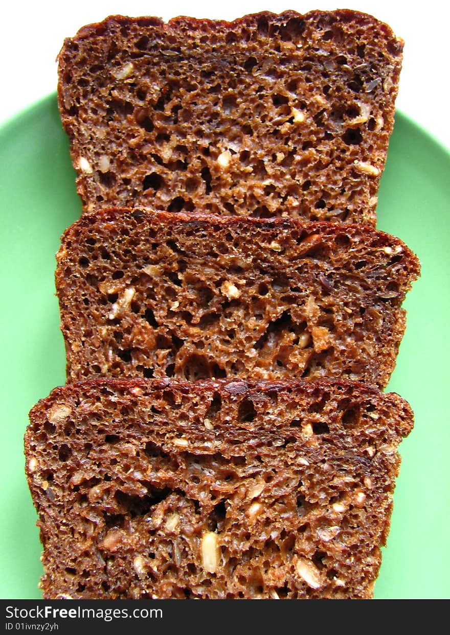 Useful and tasty bread with sunflower seeds. Black bread.