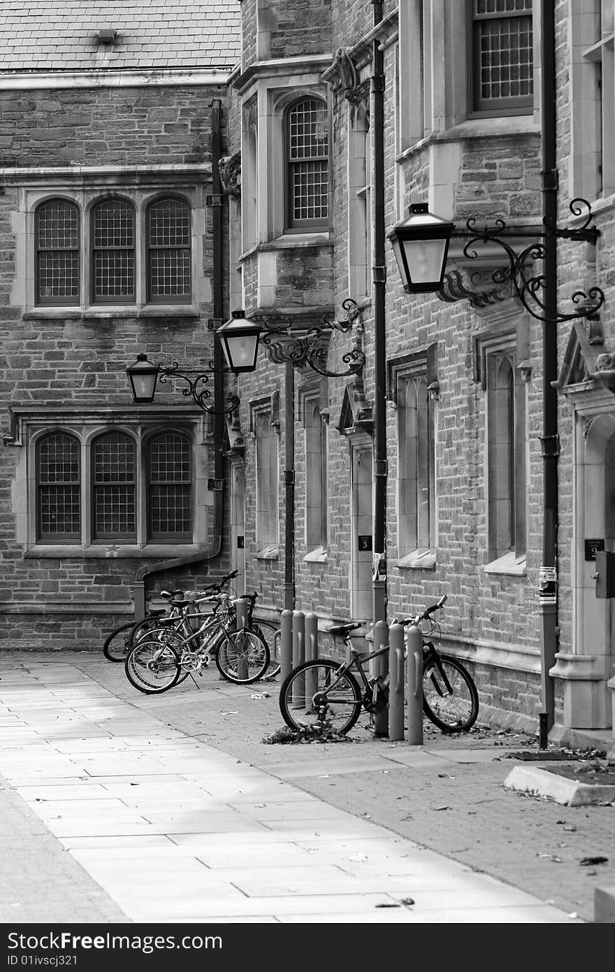 Some bicycles parked outside a building. Some bicycles parked outside a building