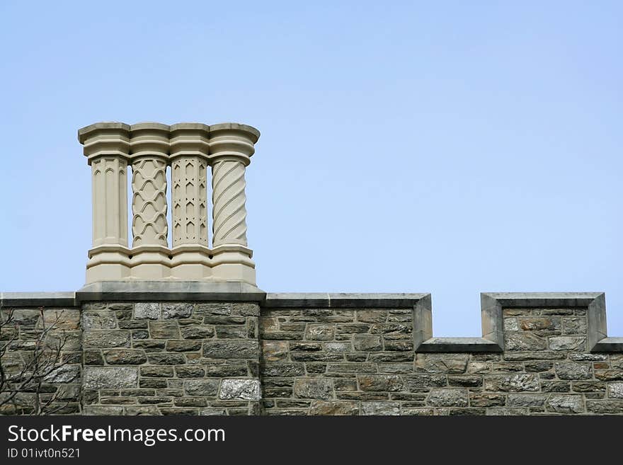 Some old chimneys on a roof. Some old chimneys on a roof