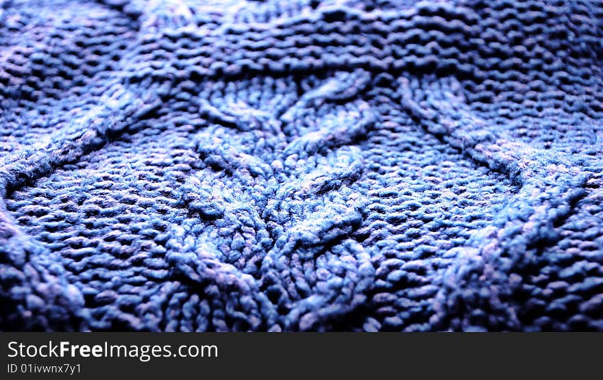 Knitted texture of blue color, pigtail. Knitted texture of blue color, pigtail