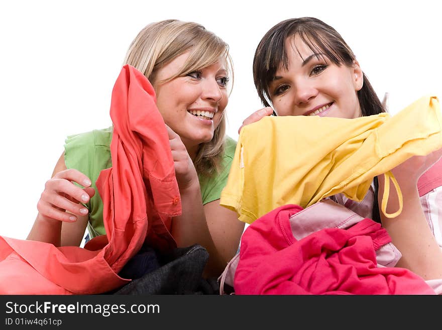 Two attractive women with clothes. Two attractive women with clothes