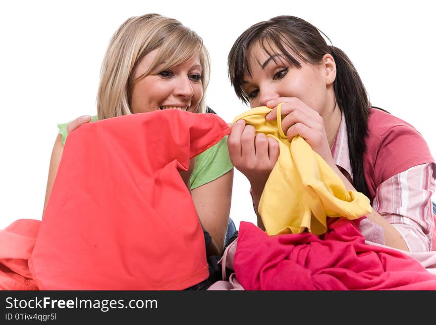 Two attractive women with clothes. Two attractive women with clothes