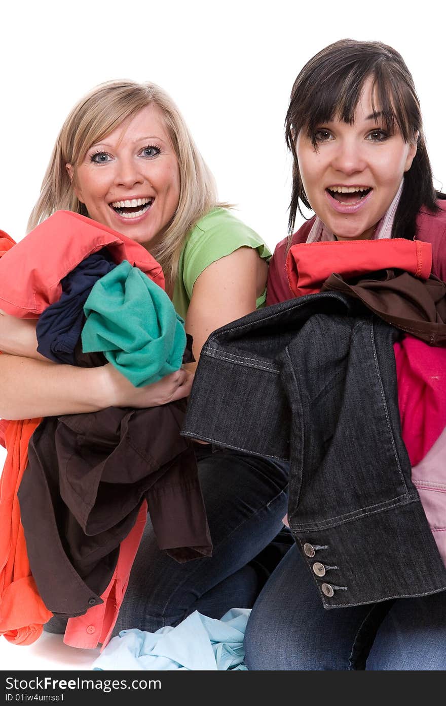 Two attractive women with clothes. Two attractive women with clothes