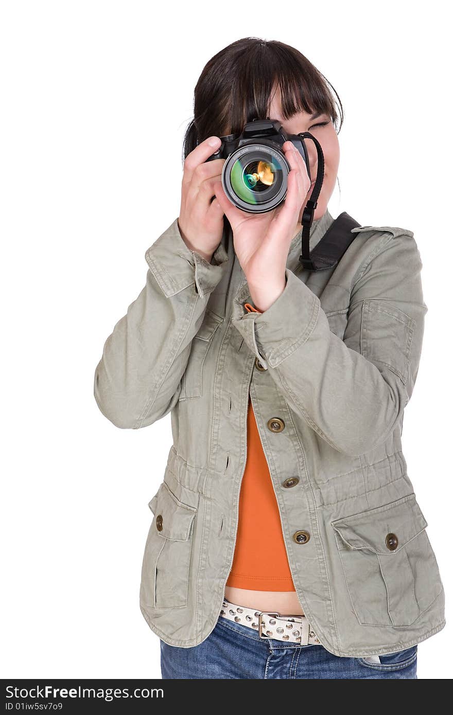 Attractive brunette woman with digital camera. over white background. Attractive brunette woman with digital camera. over white background