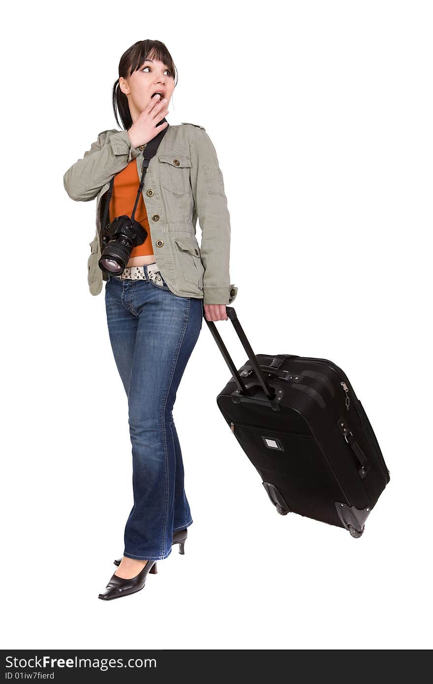 Attractive brunette woman with suitcase. over white background. Attractive brunette woman with suitcase. over white background