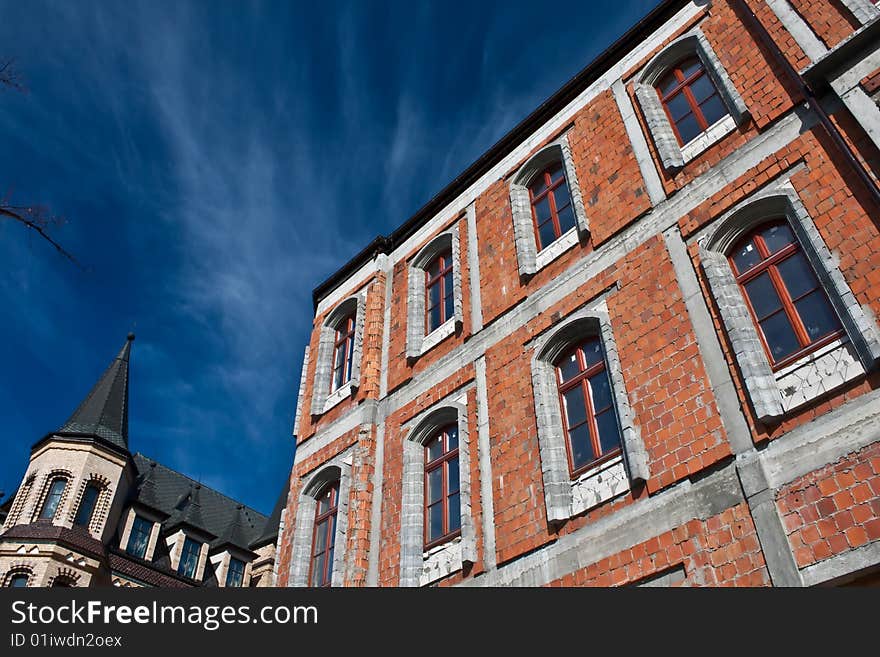 Building in construction, yard, blue sky, architecture