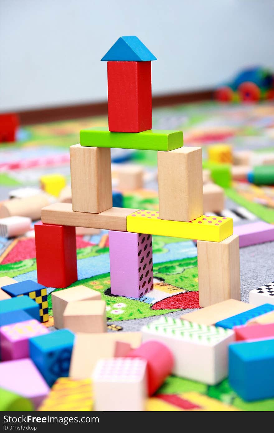 Colorful wooden blocks building, construction. Colorful wooden blocks building, construction