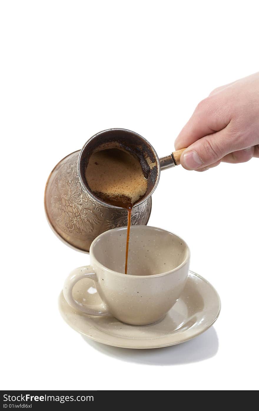 Coffee poured from coffeemaker in cup isolated