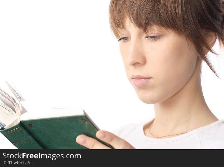 Young woman reading the book