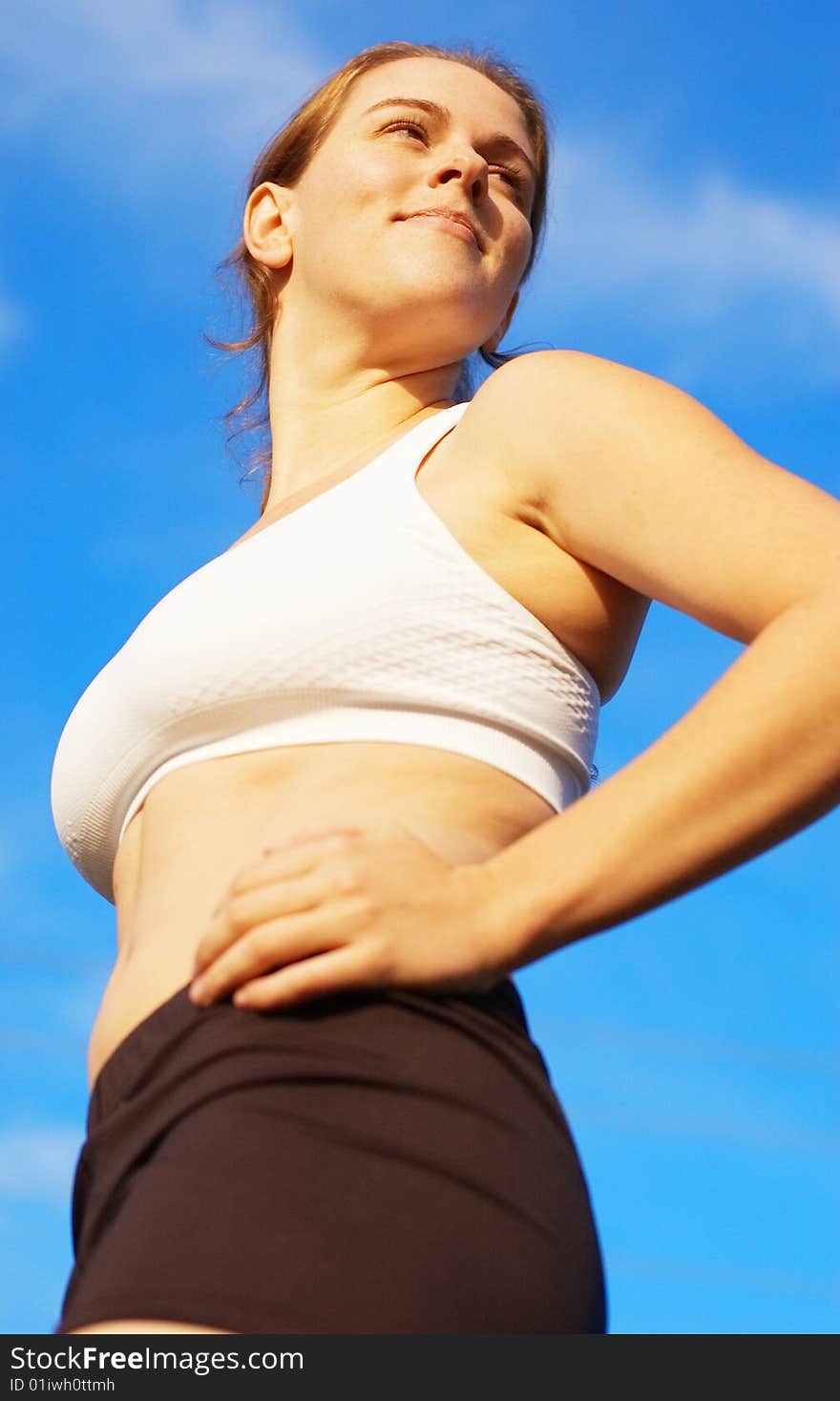 Beautiful young woman runner having a workout session. Beautiful young woman runner having a workout session.