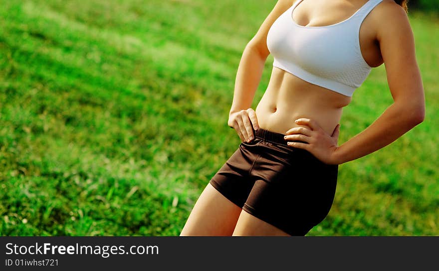 Beautiful young woman runner having a workout session. Beautiful young woman runner having a workout session.