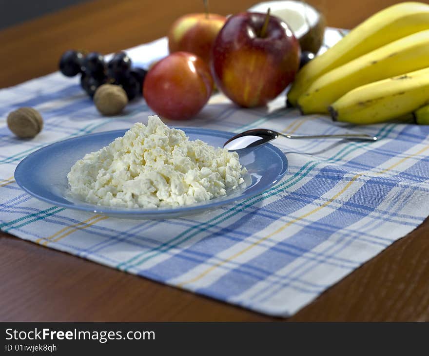 Still life on the table with curd and fruit. Still life on the table with curd and fruit