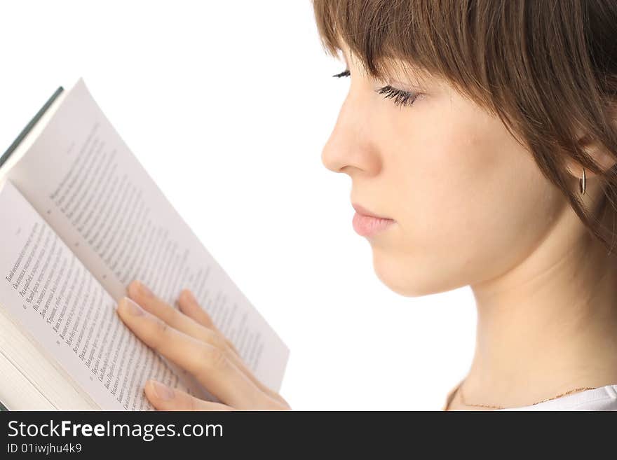 Young woman reading the book