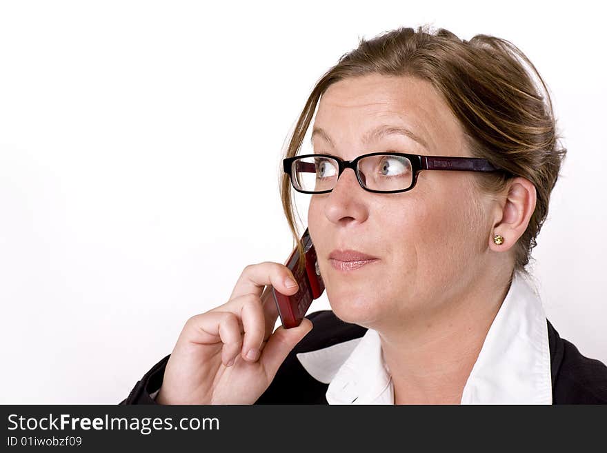 Businesswoman with phone with a surprised expression. Businesswoman with phone with a surprised expression