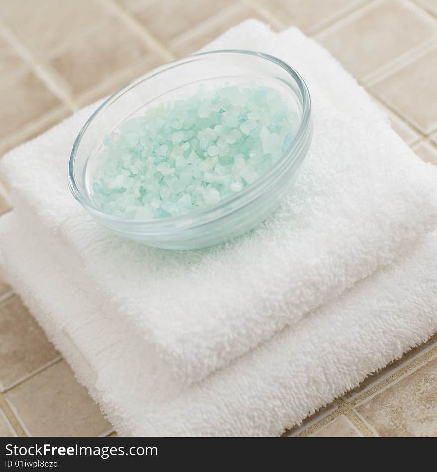 Spa display against a stone tile background.