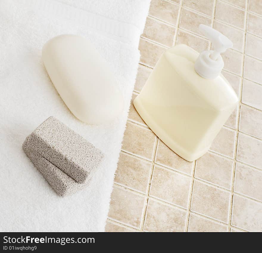 Spa display against a stone tile backdrop.