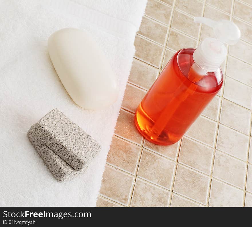 Spa display against a stone tile backdrop.