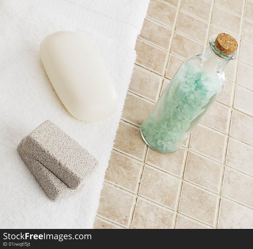 Spa display against a stone tile backdrop.