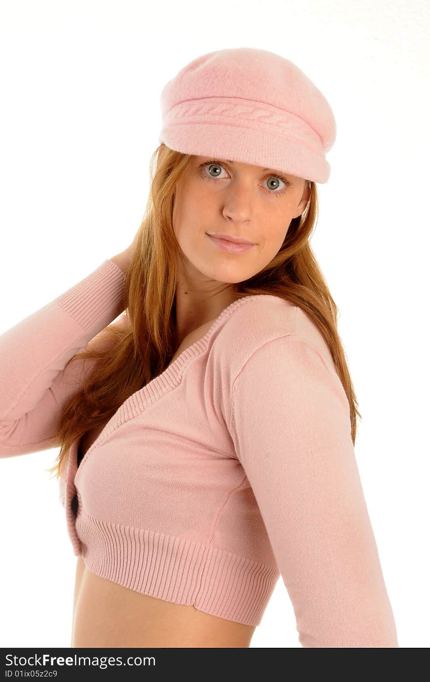 Young woman posing, wearing sexy clothes and a cap. Young woman posing, wearing sexy clothes and a cap.