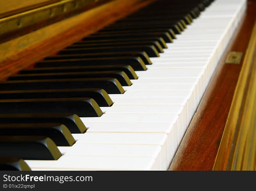 Very old piano keyboard, brown color