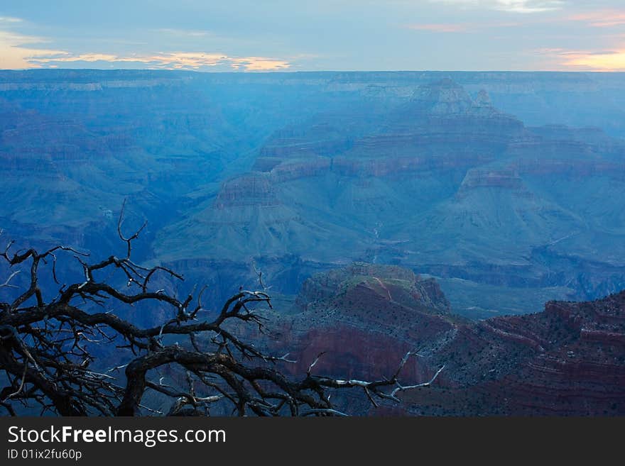 An overcast sunrise at the Grand Canyon (South Rim - Mather Point).  Grand Canyon National Park, Arizona. An overcast sunrise at the Grand Canyon (South Rim - Mather Point).  Grand Canyon National Park, Arizona.