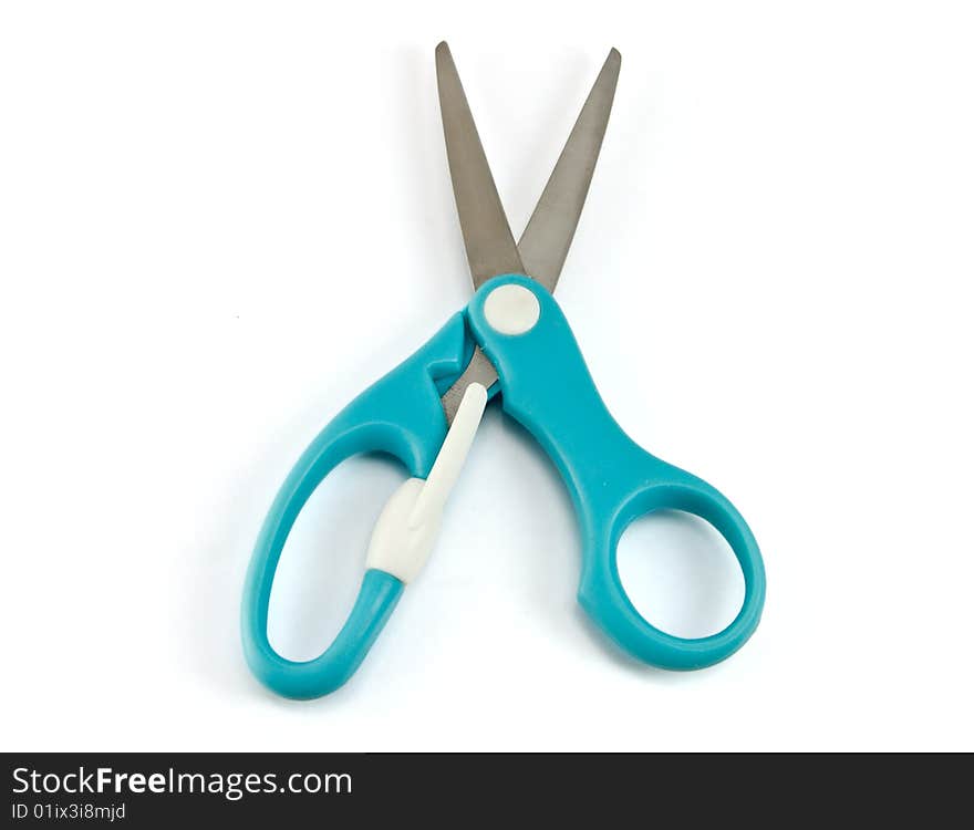 Scissors on the white background