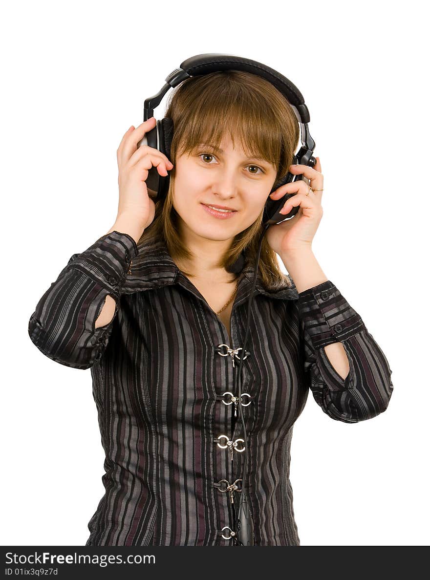 Beautiful girl listening to the music. Isolated on white.