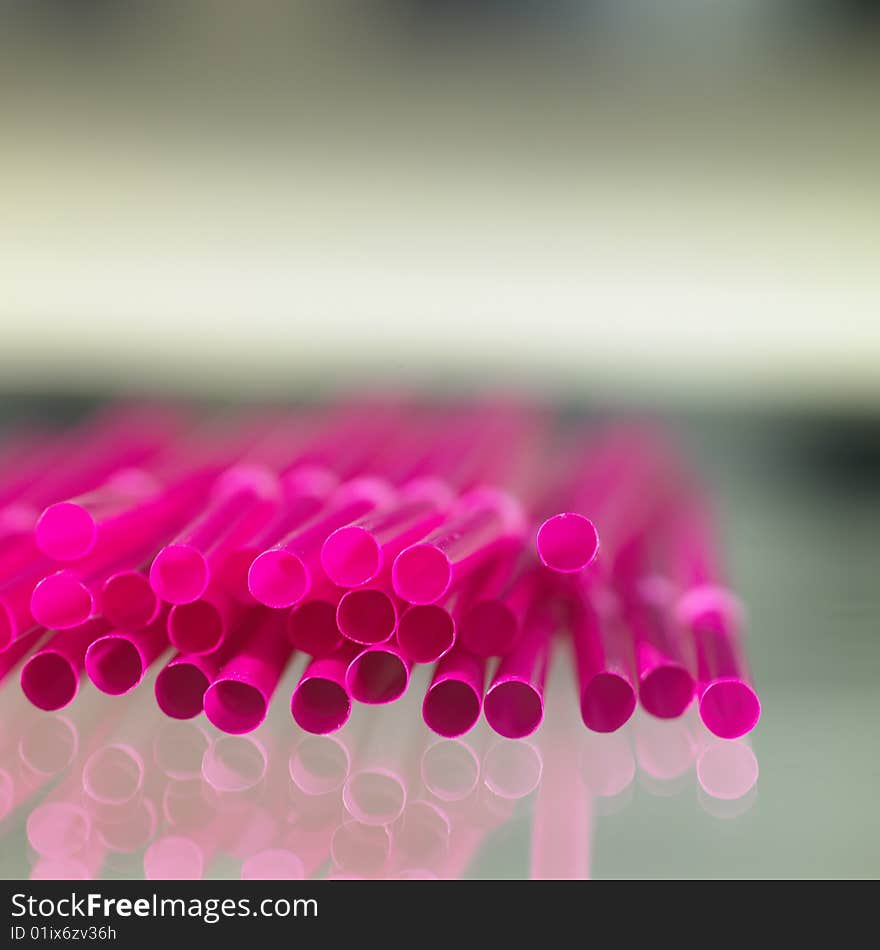 Close up of pink straws