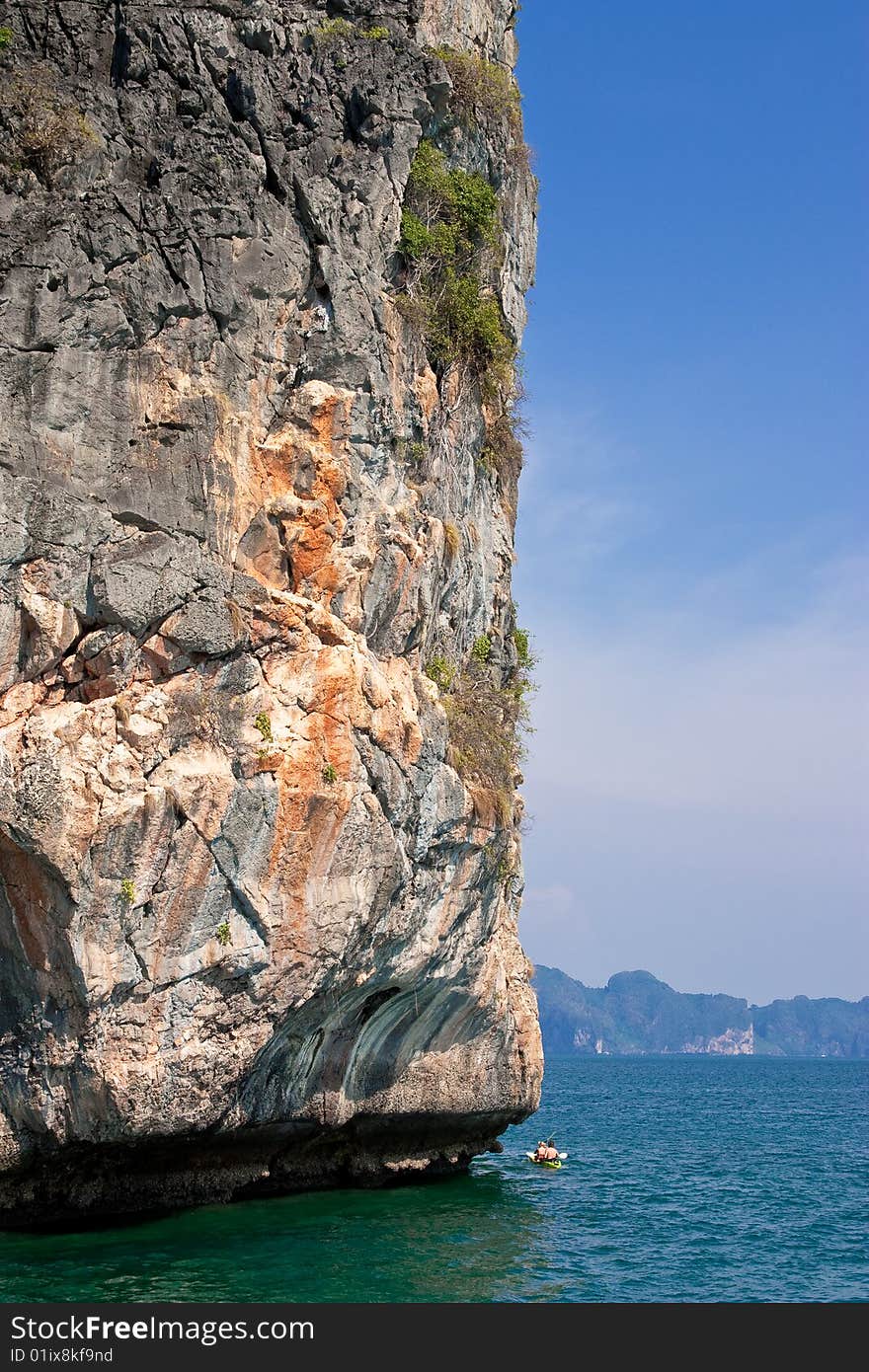 Canoist travelling around the island of southern Thailand sea. Canoist travelling around the island of southern Thailand sea.