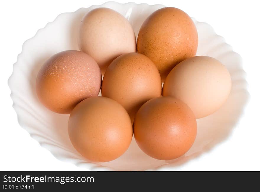 Seven eggs on plate