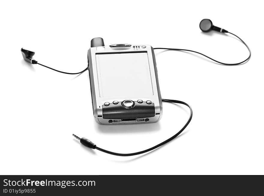 PDA phone with headphones, isolated on white. Narrow DOF with focus on the front of the PDA. PDA phone with headphones, isolated on white. Narrow DOF with focus on the front of the PDA