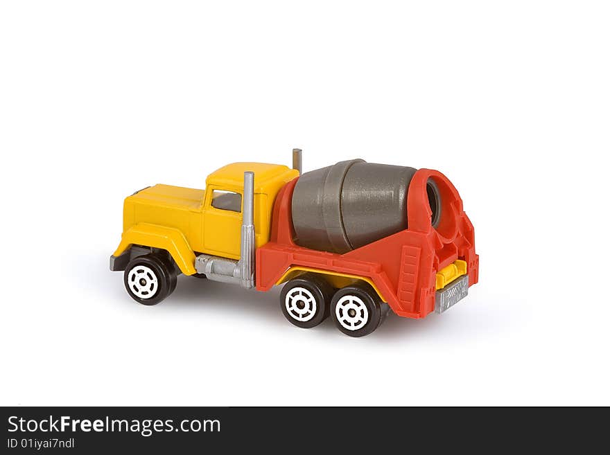 Miniature toy concrete mixer truck. Isolated on white. Miniature toy concrete mixer truck. Isolated on white.