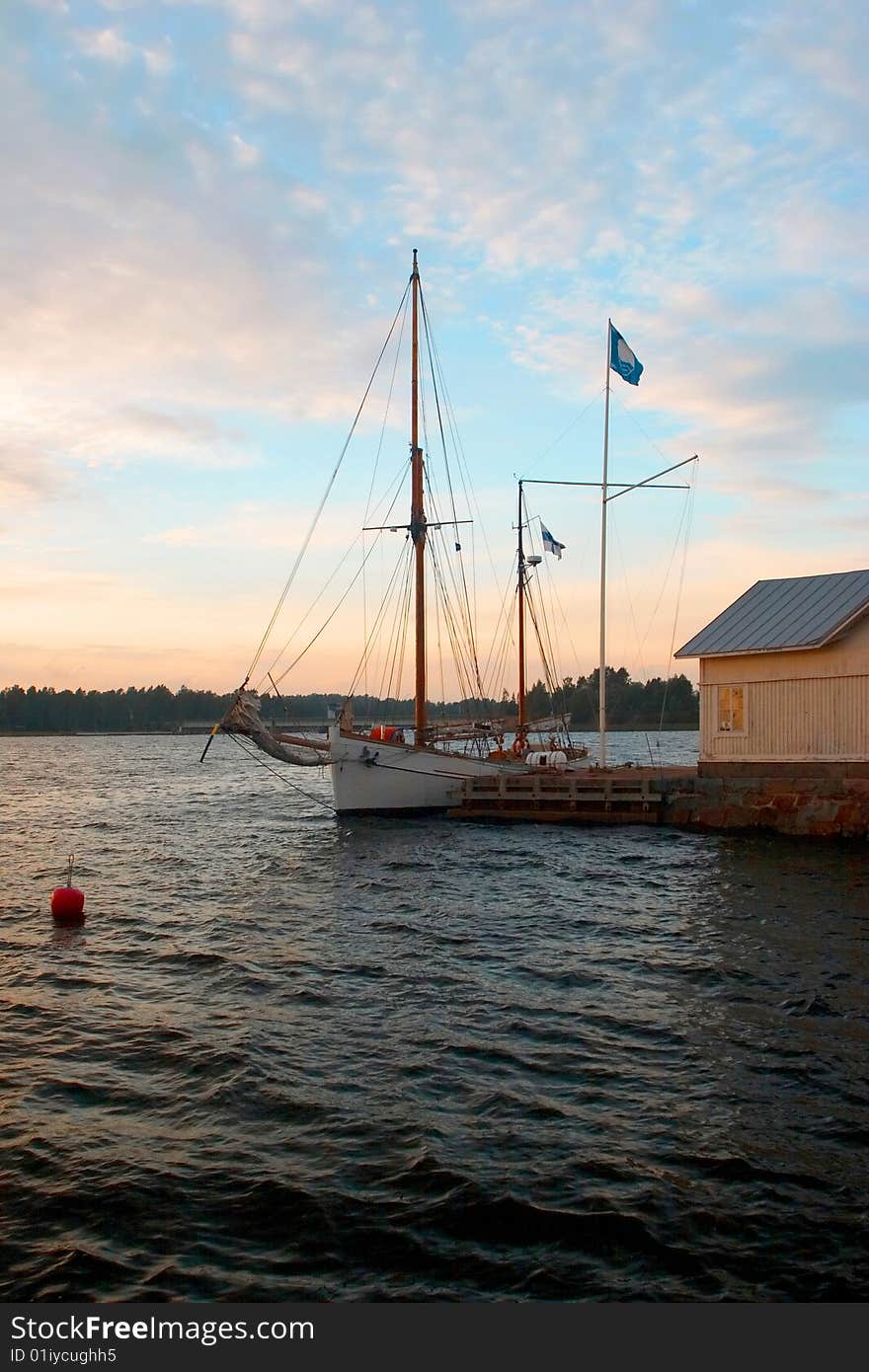 Classic wooden sail yacht moring to pier in Tamisaaree, Finland. Classic wooden sail yacht moring to pier in Tamisaaree, Finland