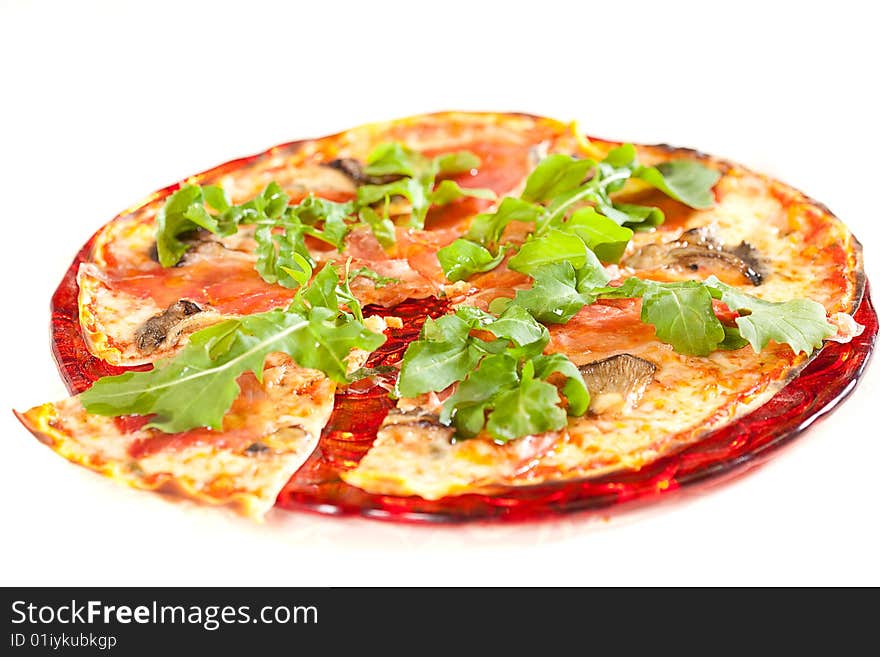 Sliced tasty pizza. Isolated over white