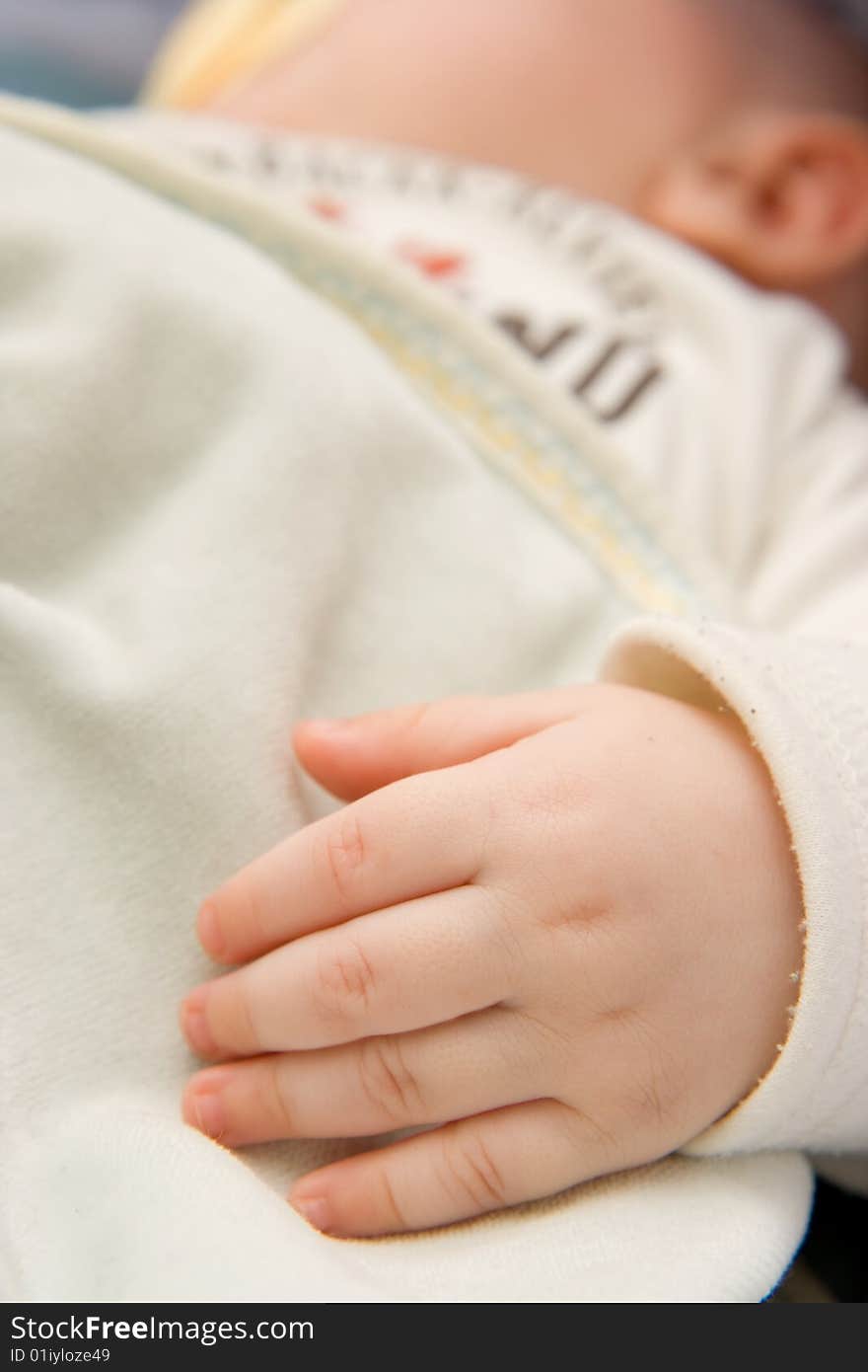 Hand of baby, meantime he is sleeping