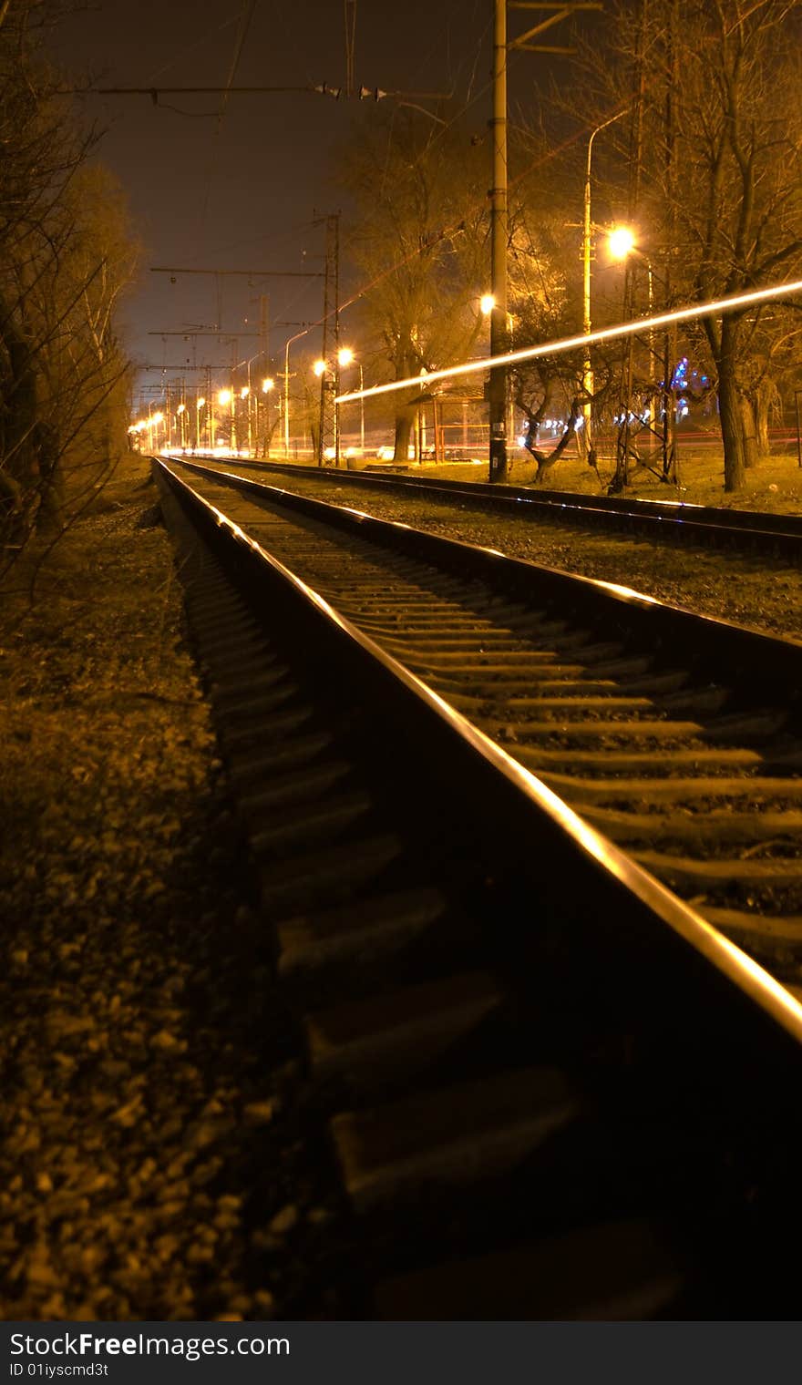 A photo of night railway. A photo of night railway