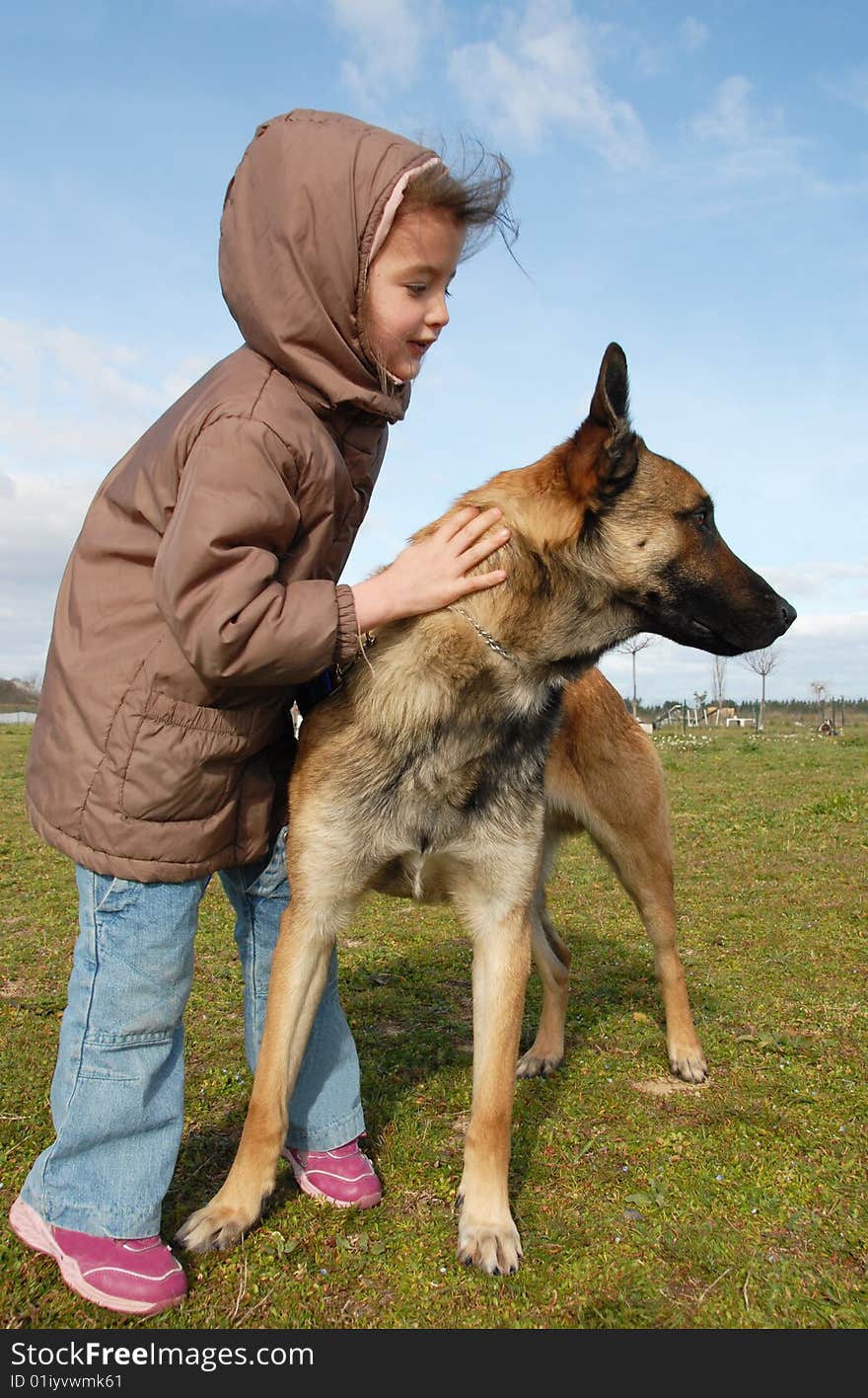 Little girl and malinois