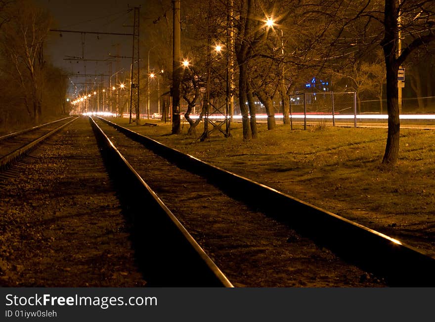 A photo of night railway. A photo of night railway