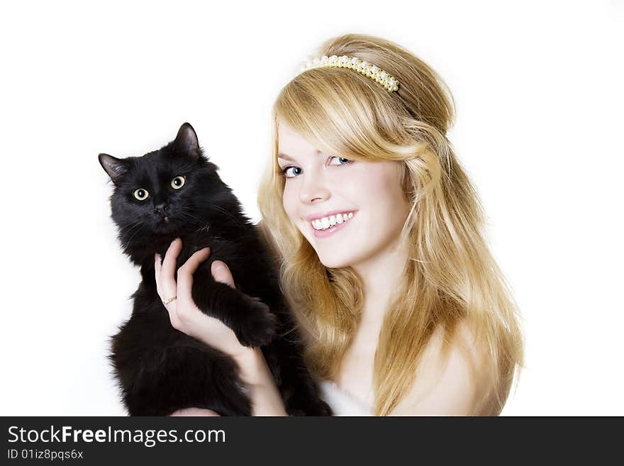 Picture of a beautiful blonde girl with a black cat in the hands of