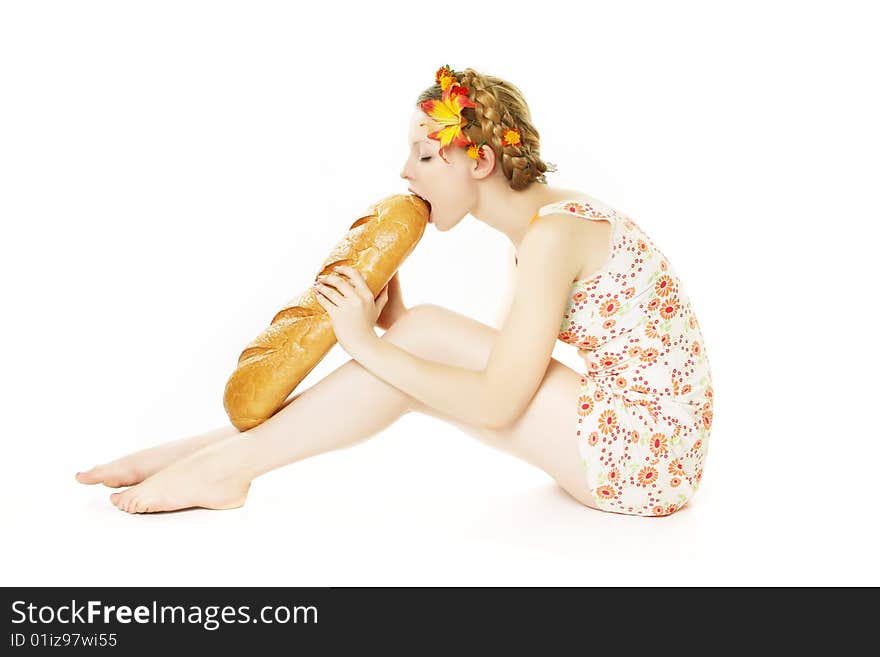 Picture of the smiling girl with a great bread