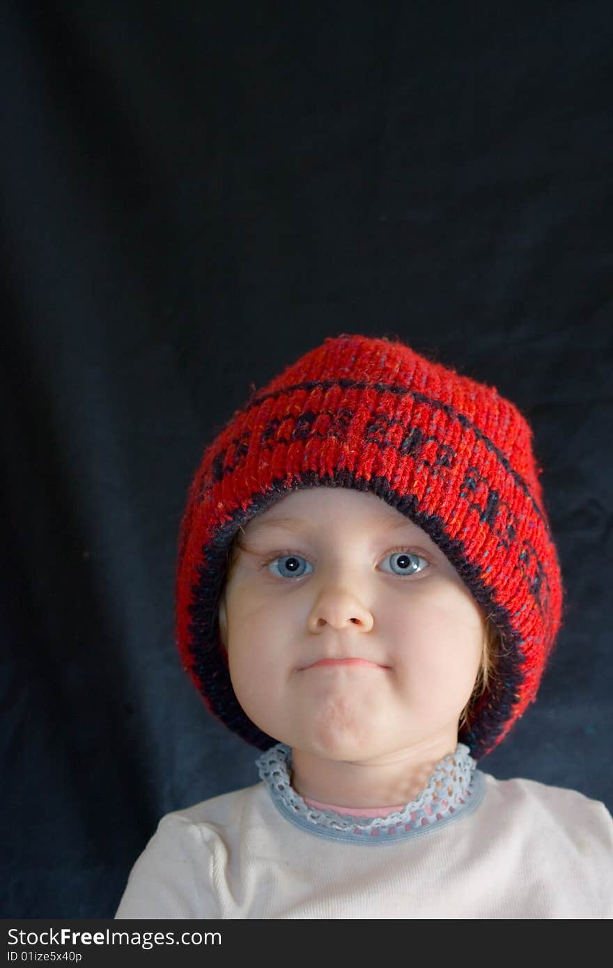 Little girl in  red winter hat. Little girl in  red winter hat