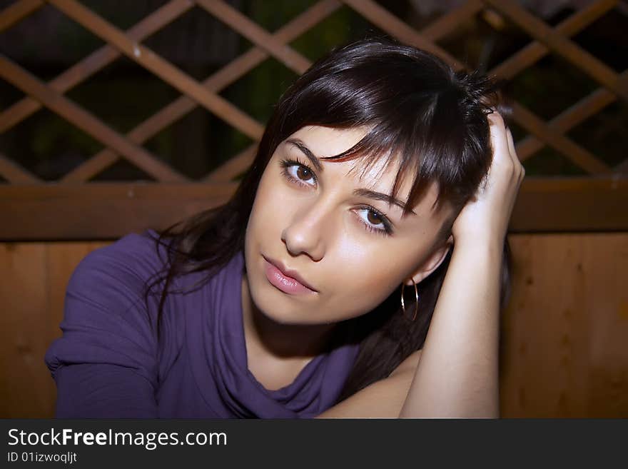 Young girl portrait. sitting in terrace