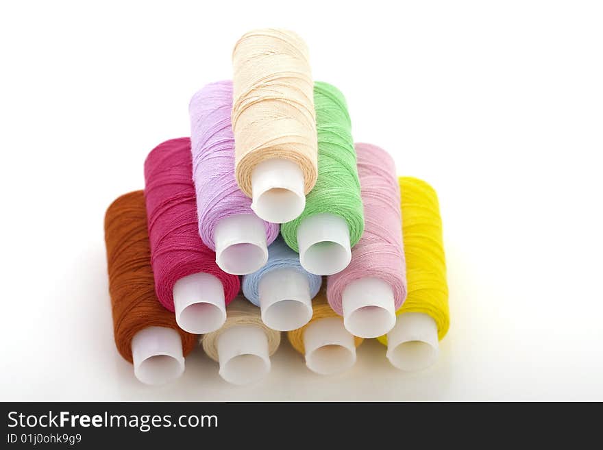 Image of the colorful spools threads