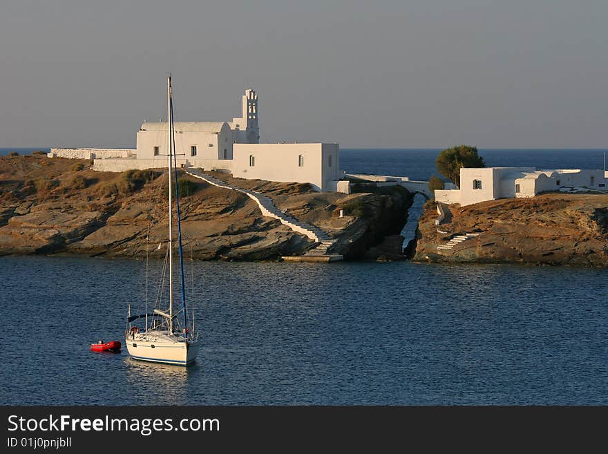 Seascape With The Boat And Greek Architecture