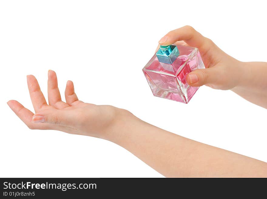 Hands and perfume isolated on white background