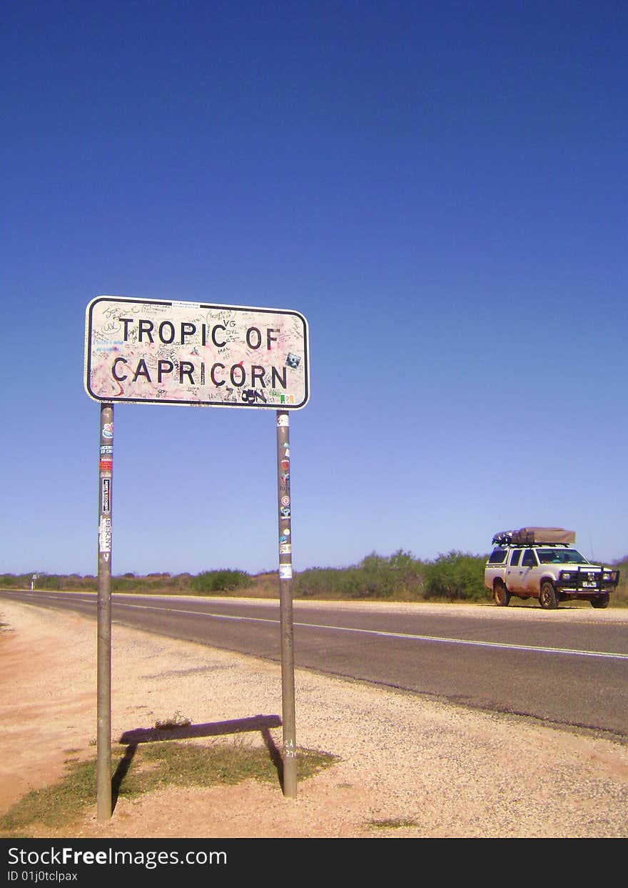 Tropic of Capricorn sign with 4WD in the background.  Taken in Western Australia