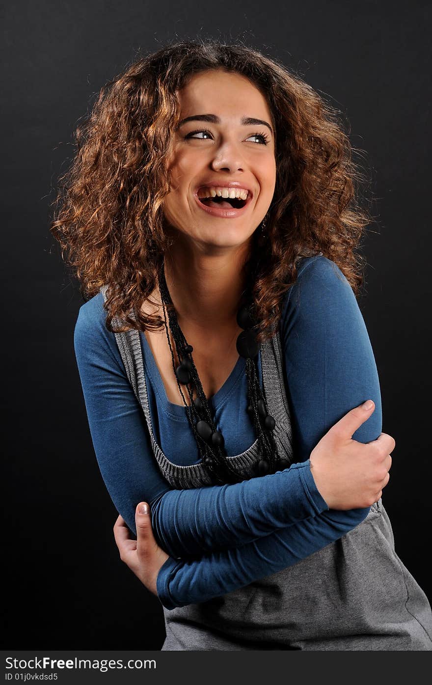 Young beautiful woman's portrait
over black