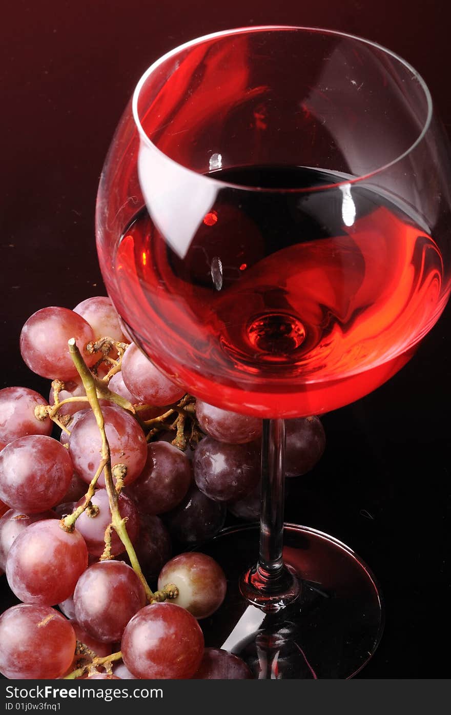 Grapes and glass of wine